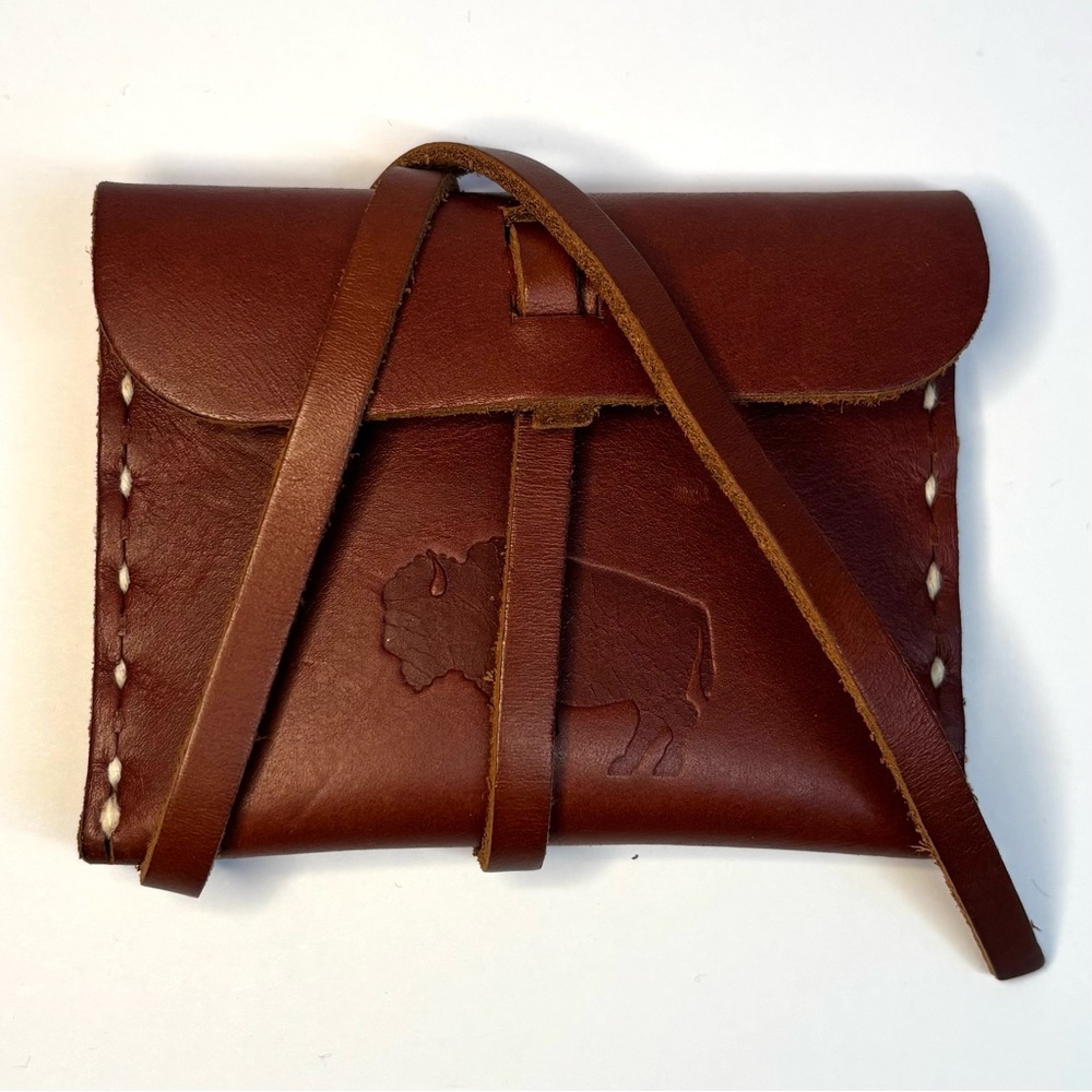 Leather pouch with an embossed buffalo
